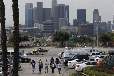 Can you pay cash for parking at Dodger Stadium?