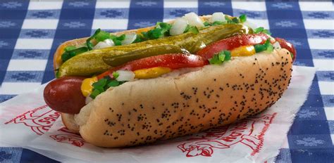 How are hot dogs cooked in Chicago?