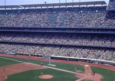 How much are seats behind home plate at Dodger Stadium?