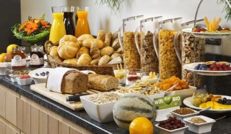 Is it OK to take food from breakfast in hotel?