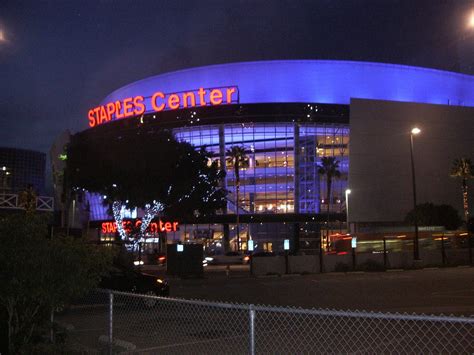 Do the Lakers own Staples Center?