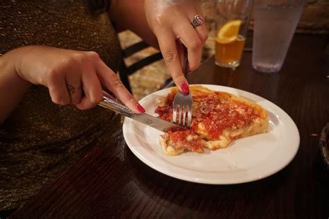 Do you eat Chicago pizza with a fork?