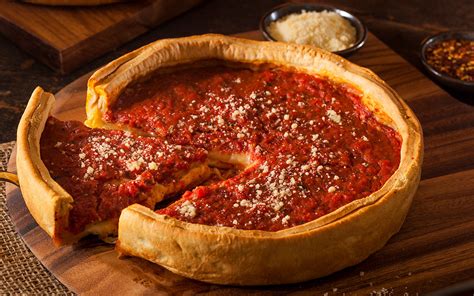 Does Chicago deep dish pizza have sauce on top?