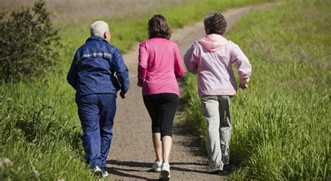 How fast should a 65 year old woman walk a mile?