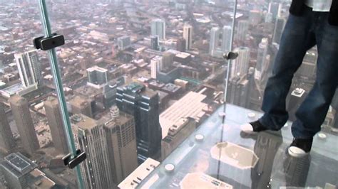 What famous building in Chicago has a glass floor?