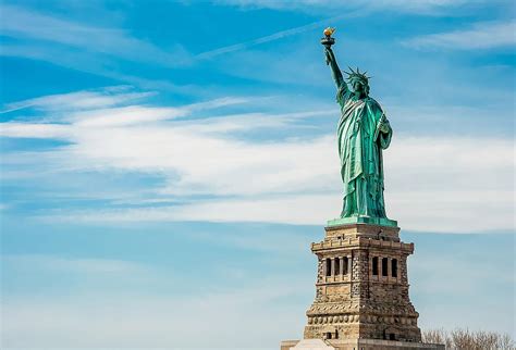 What is the best time of day to visit the Statue of Liberty?