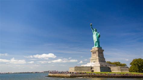 Where is the best place to take photo with the Statue of Liberty?