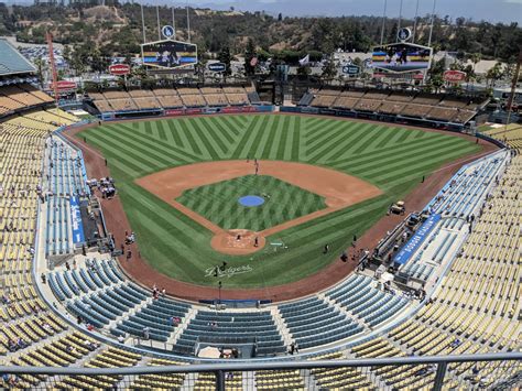 Where should I sit at Dodger Stadium to avoid sun?