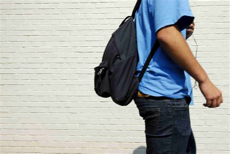 Why can't you wear your backpack on your back in museums?