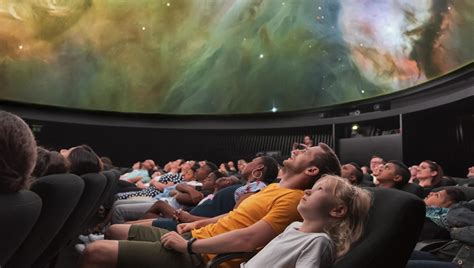 Why do people go to a planetarium?