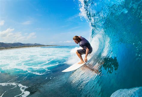 How do surfers know when to surf?