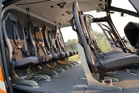 How many passengers can sit in a helicopter?