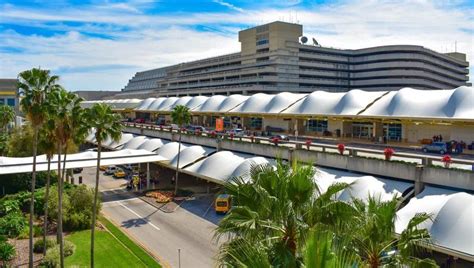 Which Orlando airport is cheaper to fly into?