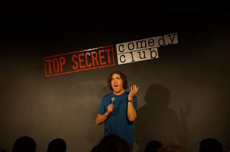 Who owns the Top Secret Comedy club?