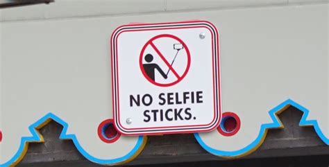 Why doesn t Disney allow selfie sticks?