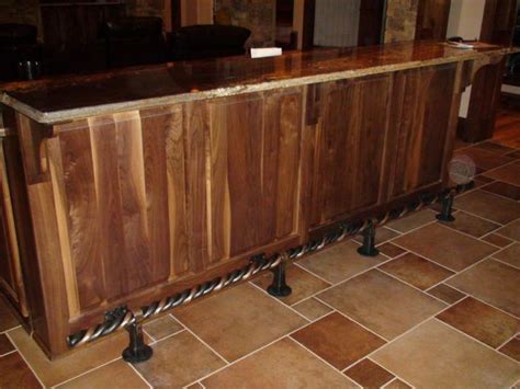 Why is there a foot bar at a bar?