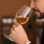 Why should you smell wine before tasting?
